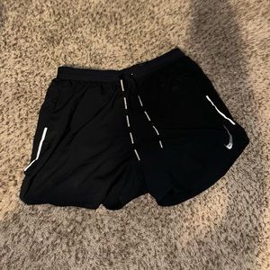 Black Large Nike Running shorts!! Very comfortable and easy to move in!